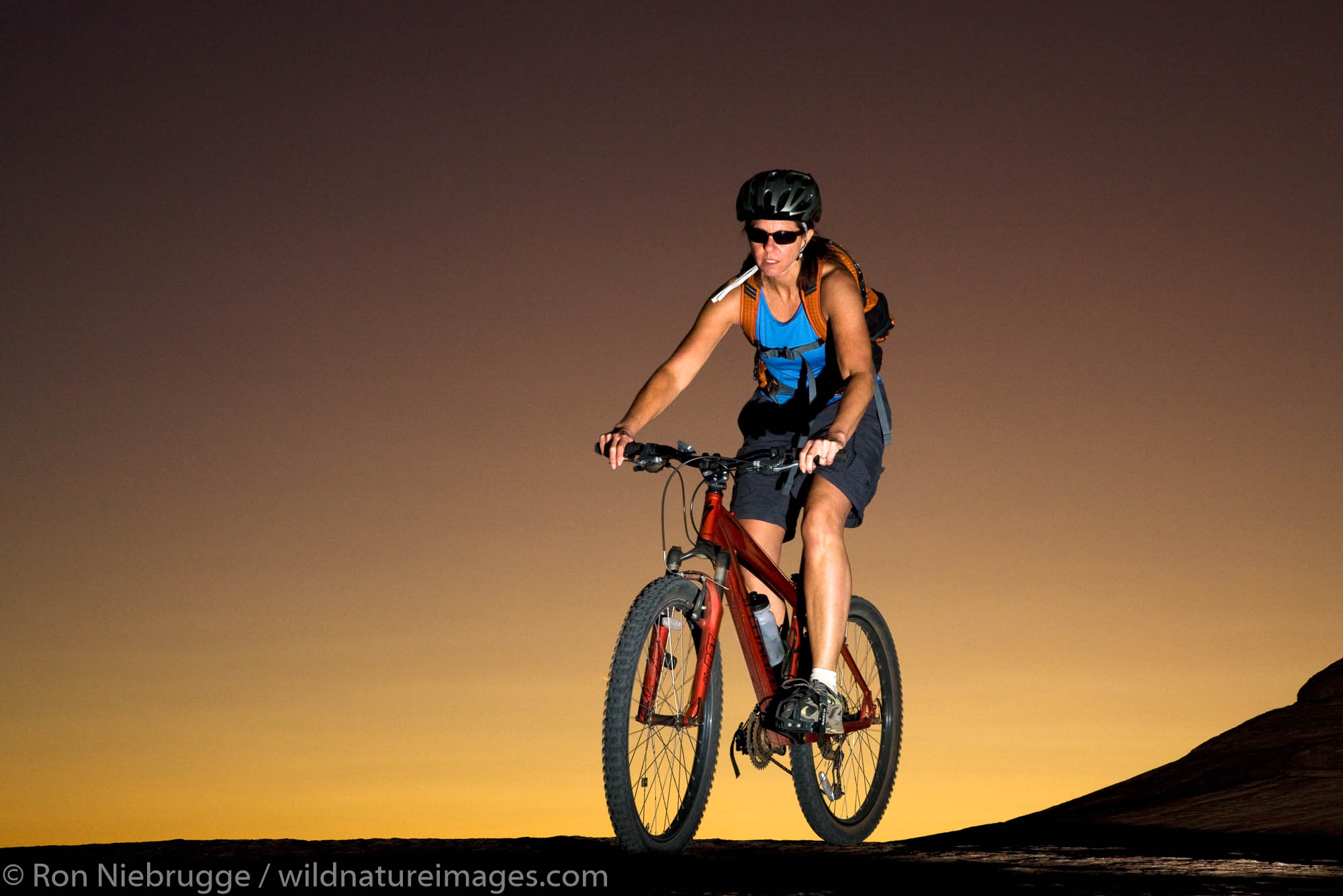 Mountain biking the famous Slickrock Trail, Moab, Utah.  (model released)