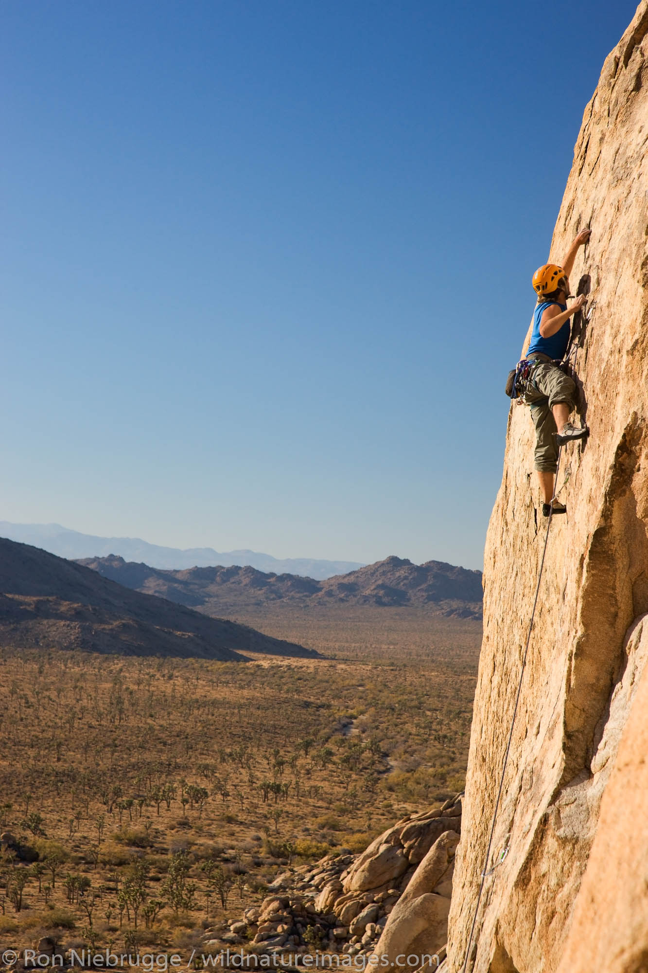 Thomas Vetsch rock climbing in Joshua Tree National Park, California.  (model released)