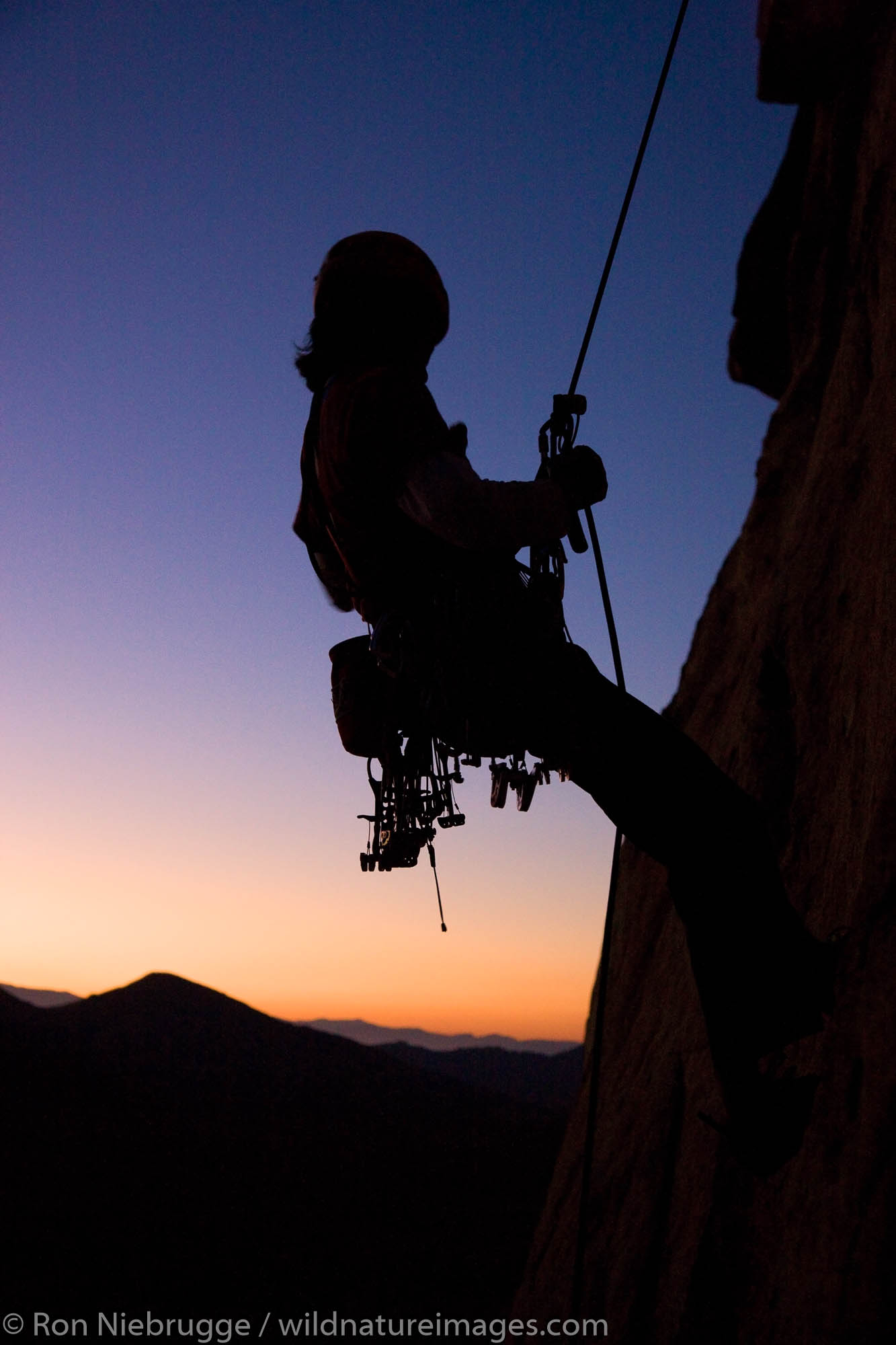 Ernest Sierras rock climbing in Joshua Tree National Park, California.  (model released)