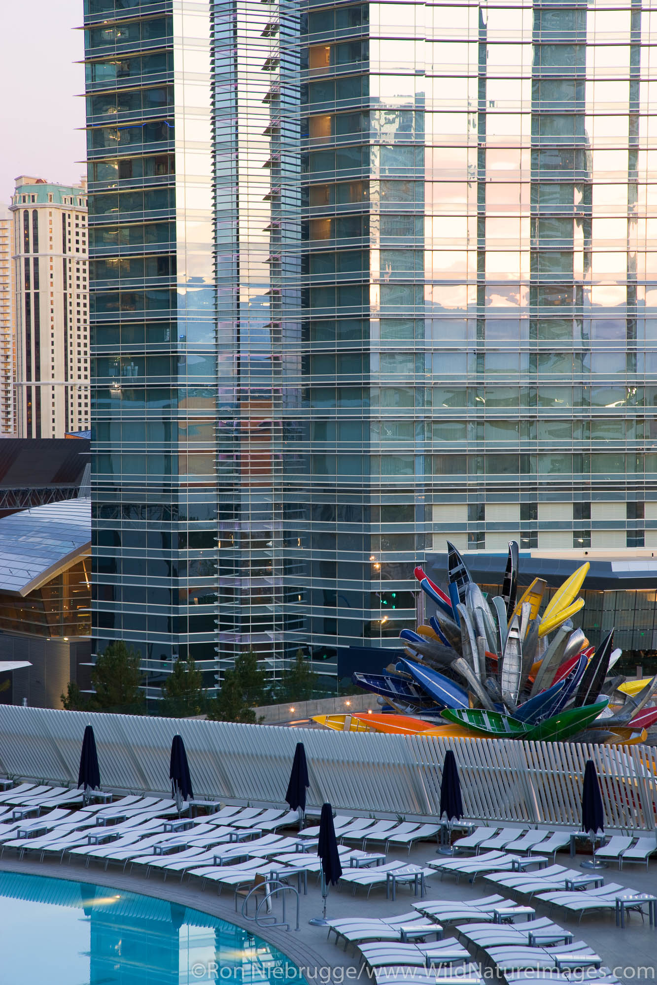 The Vdara pool with the Aria Resort and Casino in the background, City Center, Las Vegas, Nevada.
