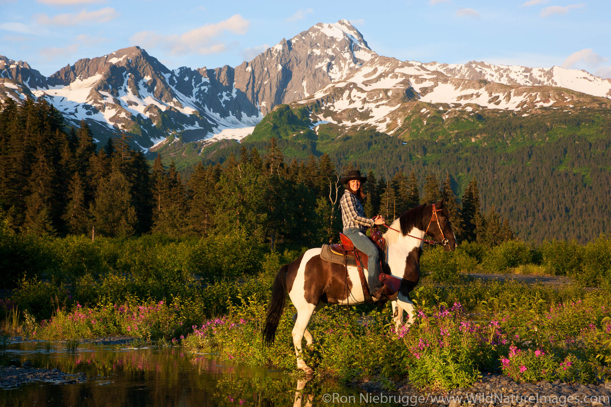 Breanna Bardarson horseback riding near Resurrection Bay, Seward, Alaska.