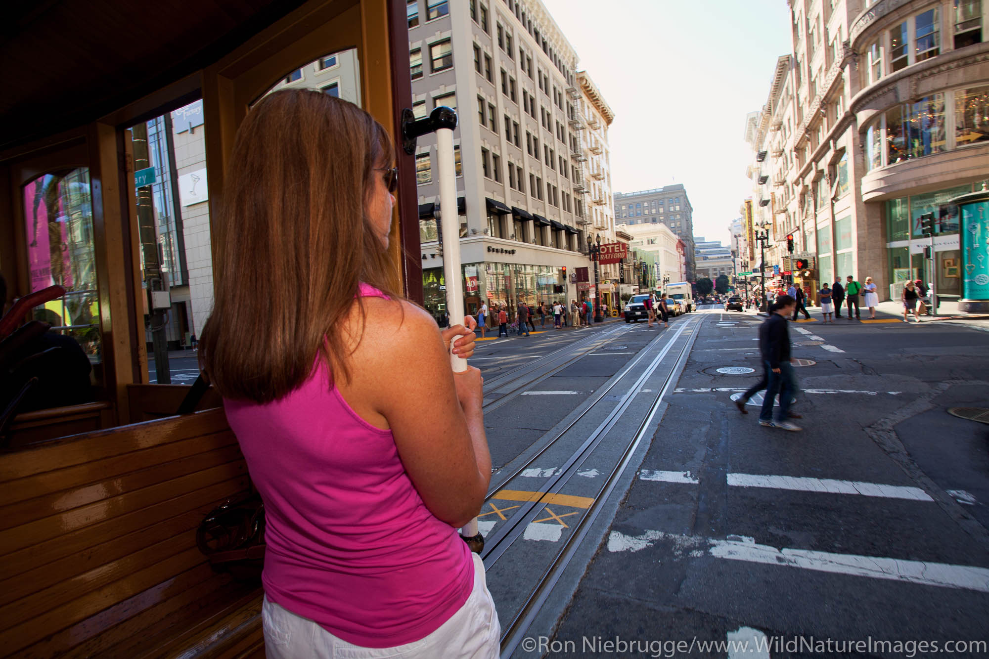 Riding the famous cable cars in San Francisco, CA (model released)