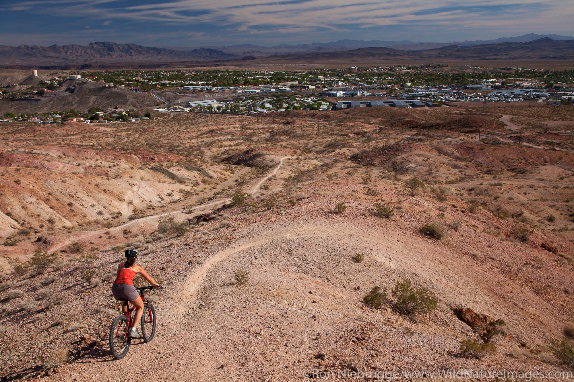 Mountain biking on the trails at Bootleg Canyon Mountain Bike Park, Boulder City, Nevada (model released)