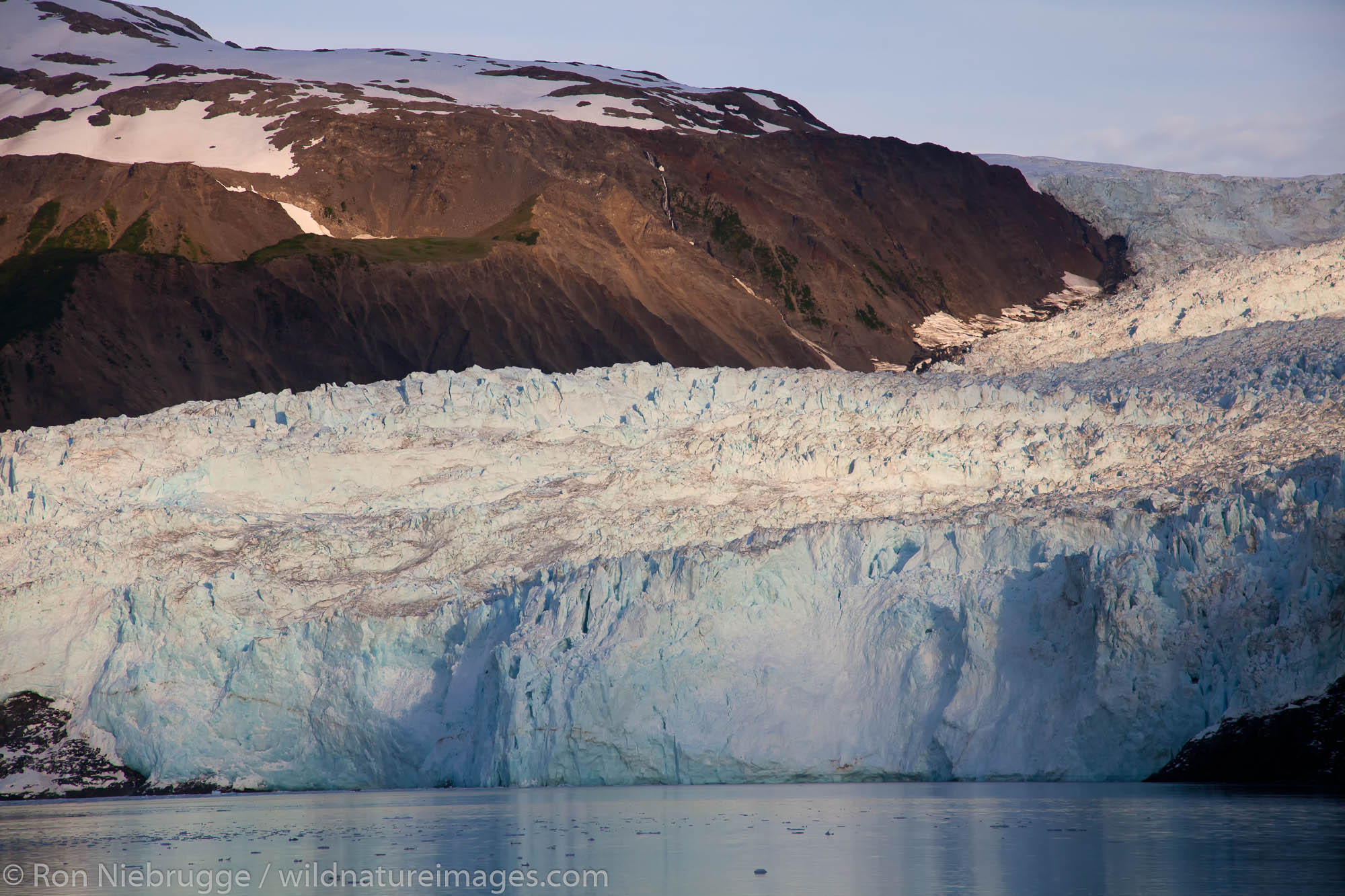 Sunrise on Aialik Glacier and Aialik Bay, Kenai Fjords National Park, near Seward, Alaska.