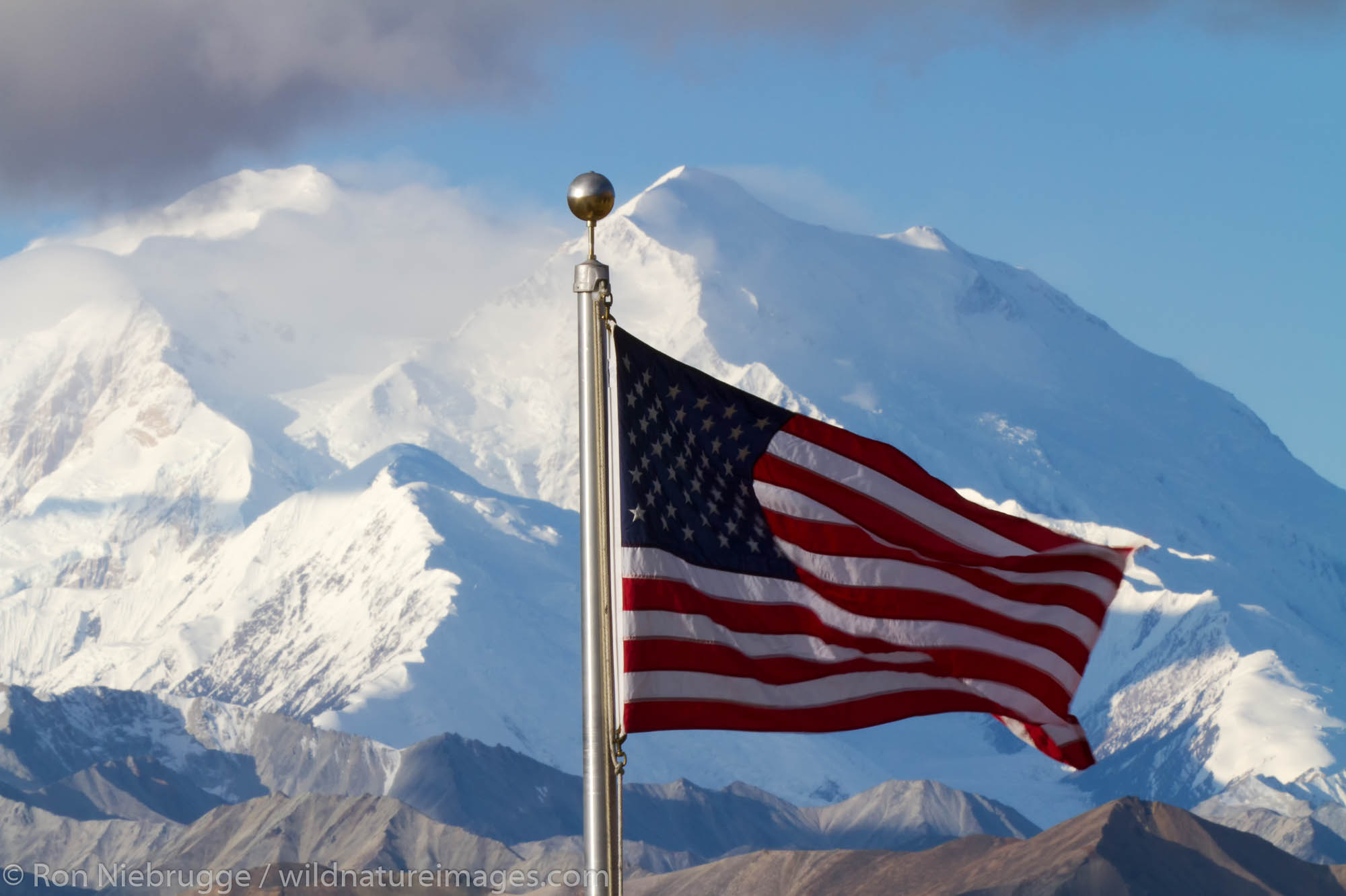 American flag in front of Mt. McKinley, Eielson Visitor Center, Denali National Park, Alaska.