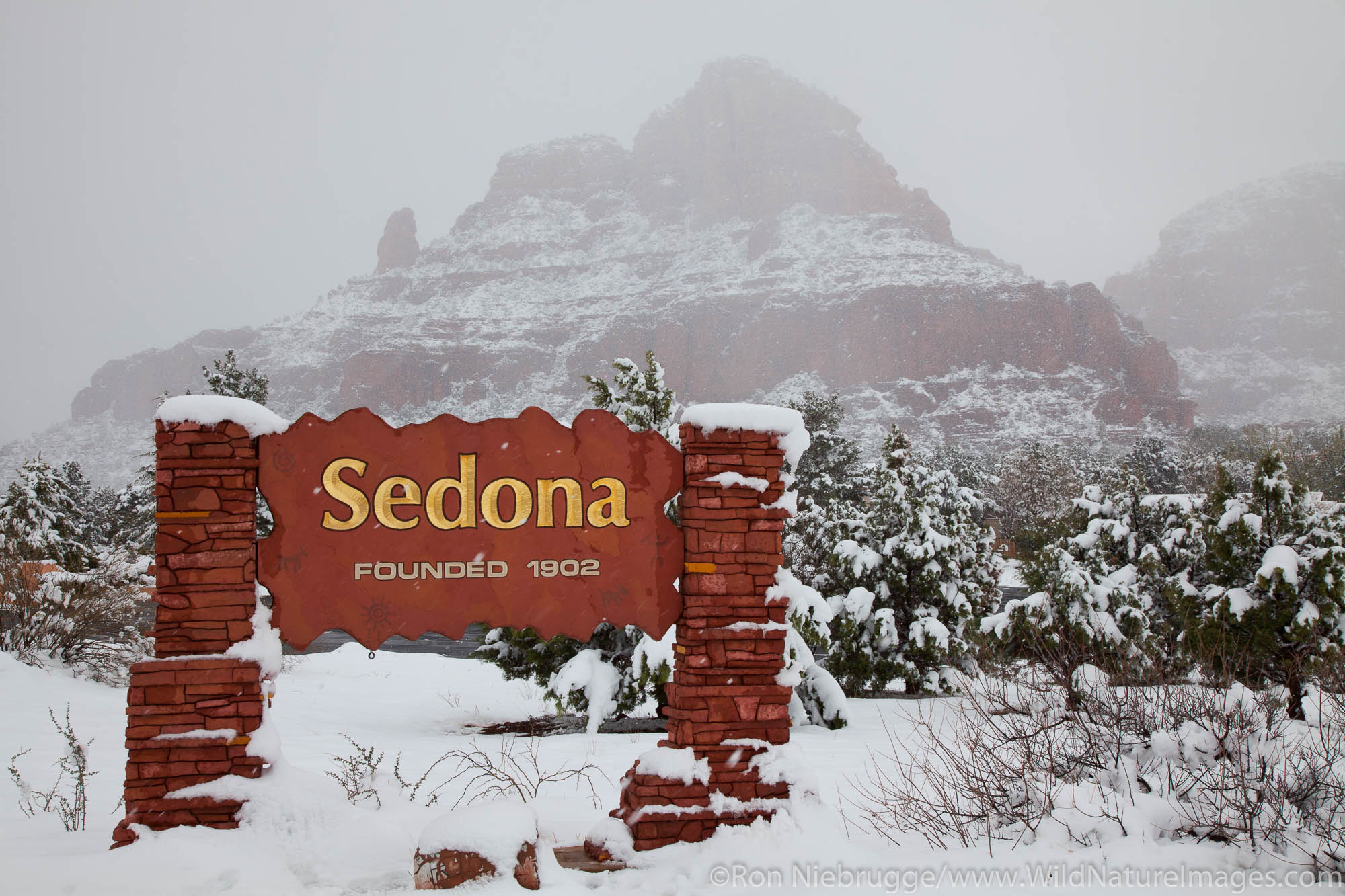 Winter snow on the welcome sign, Sedona, Arizona.