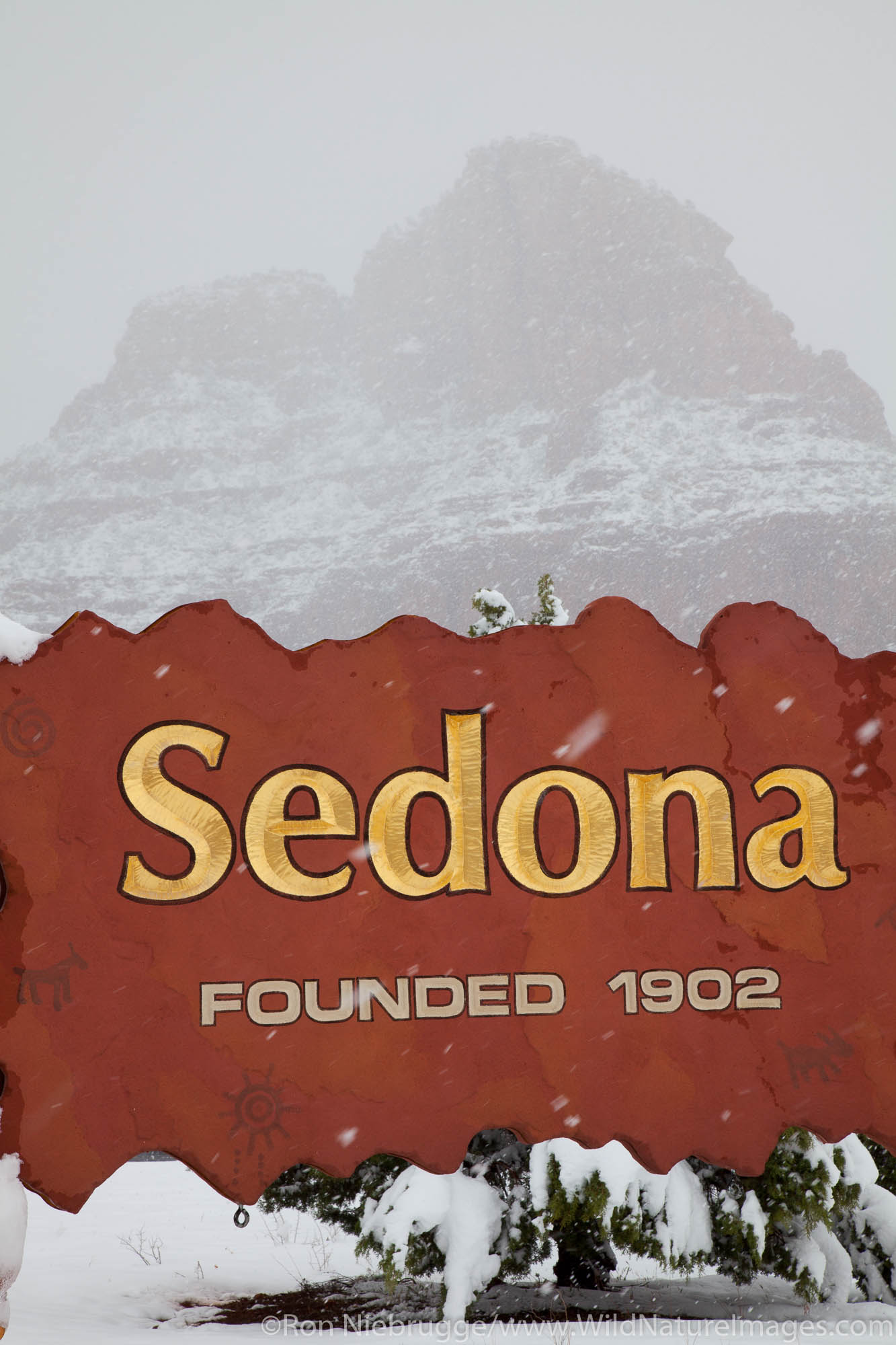 Winter snow on the welcome sign, Sedona, Arizona.
