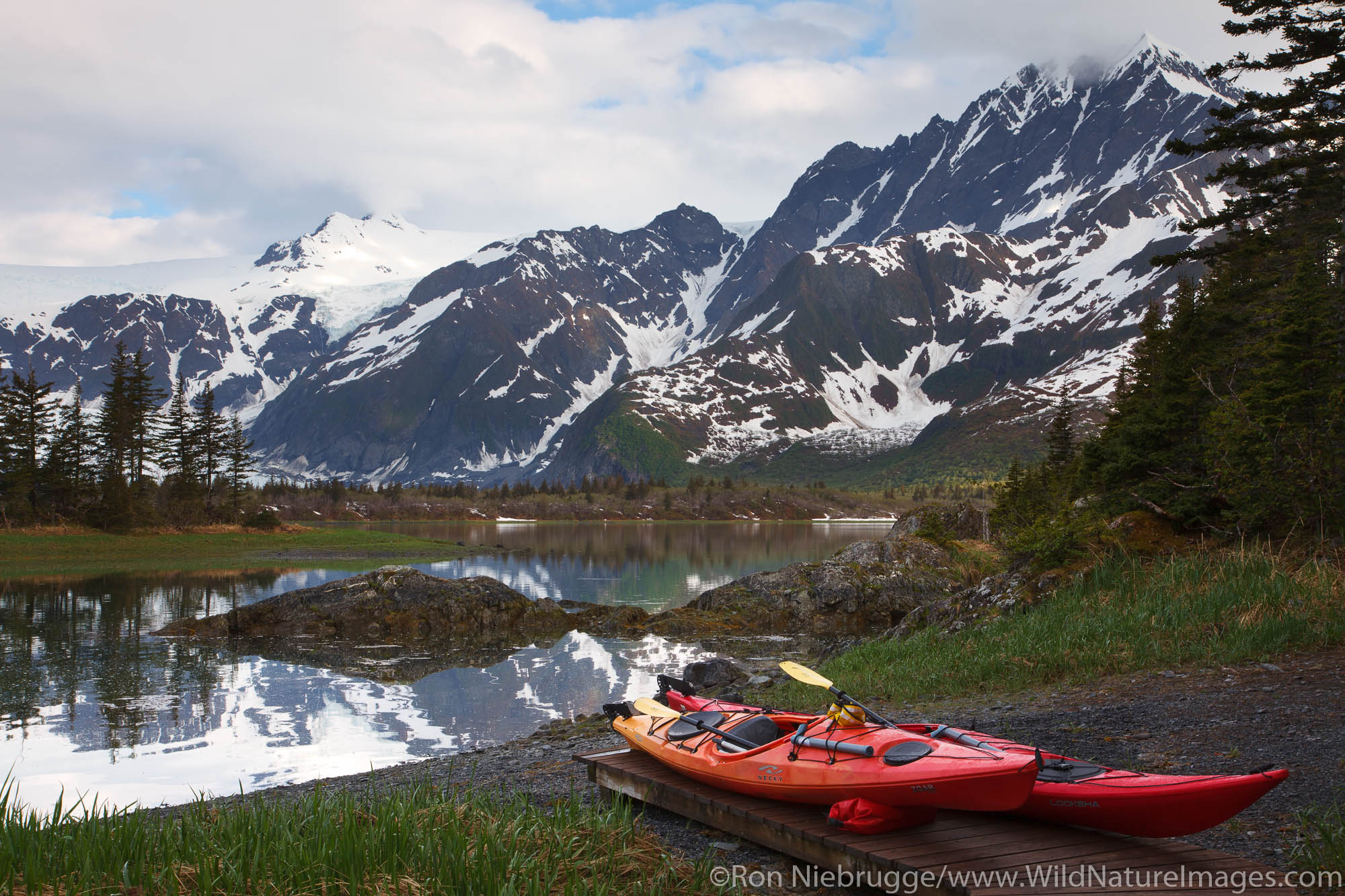 Kayaks at Pedersen Lagoon from the Kenai Fjords Glacier Lodge, Kenai Fjords National Park, near Seward, Alaska.
