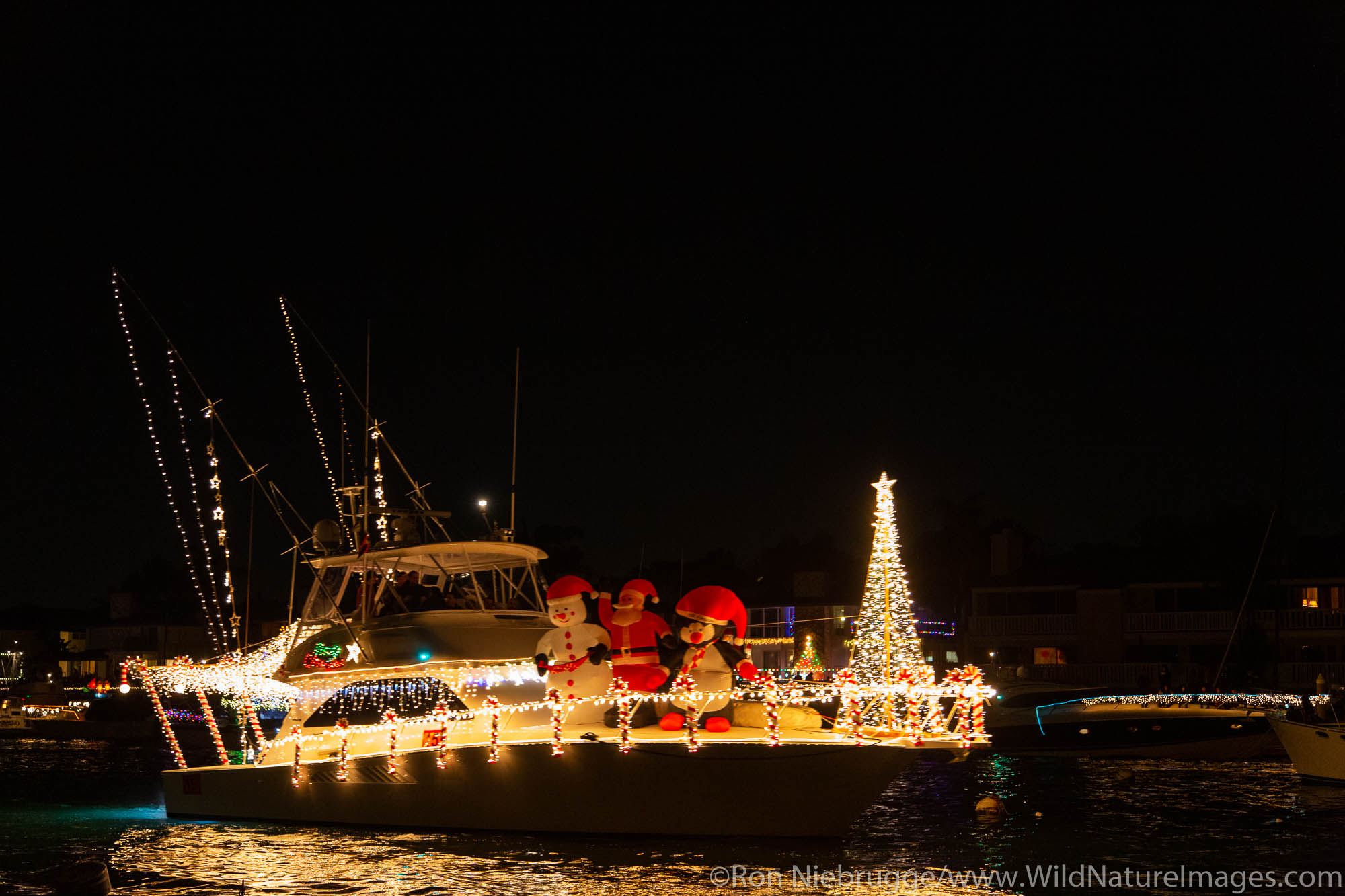 Balboa Island during the Christmas Boat Parade, Newport Beach, Orange County, California.