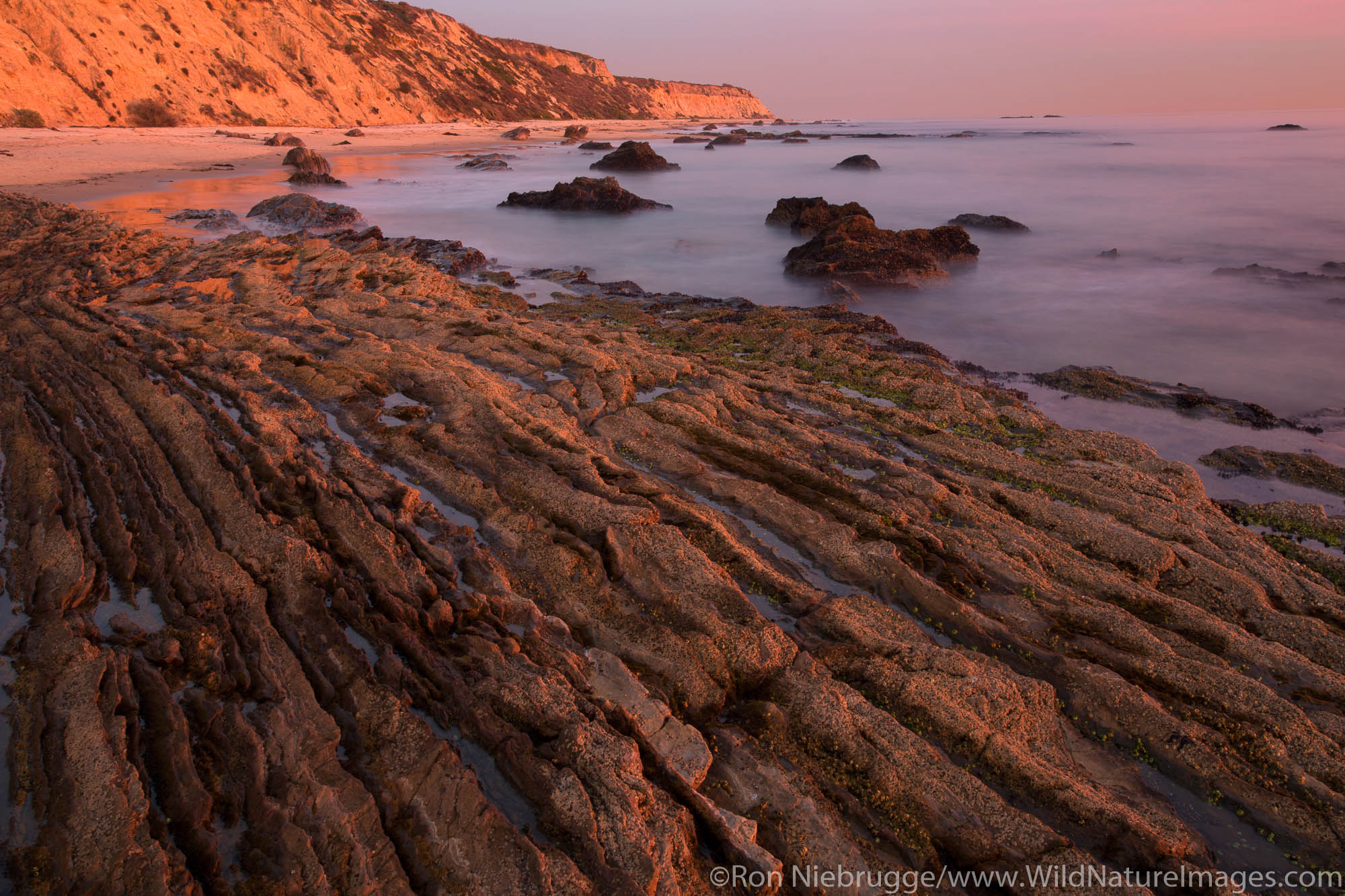 Sunset at Crystal Cove State Park, Newport Beach, Orange County, California.
