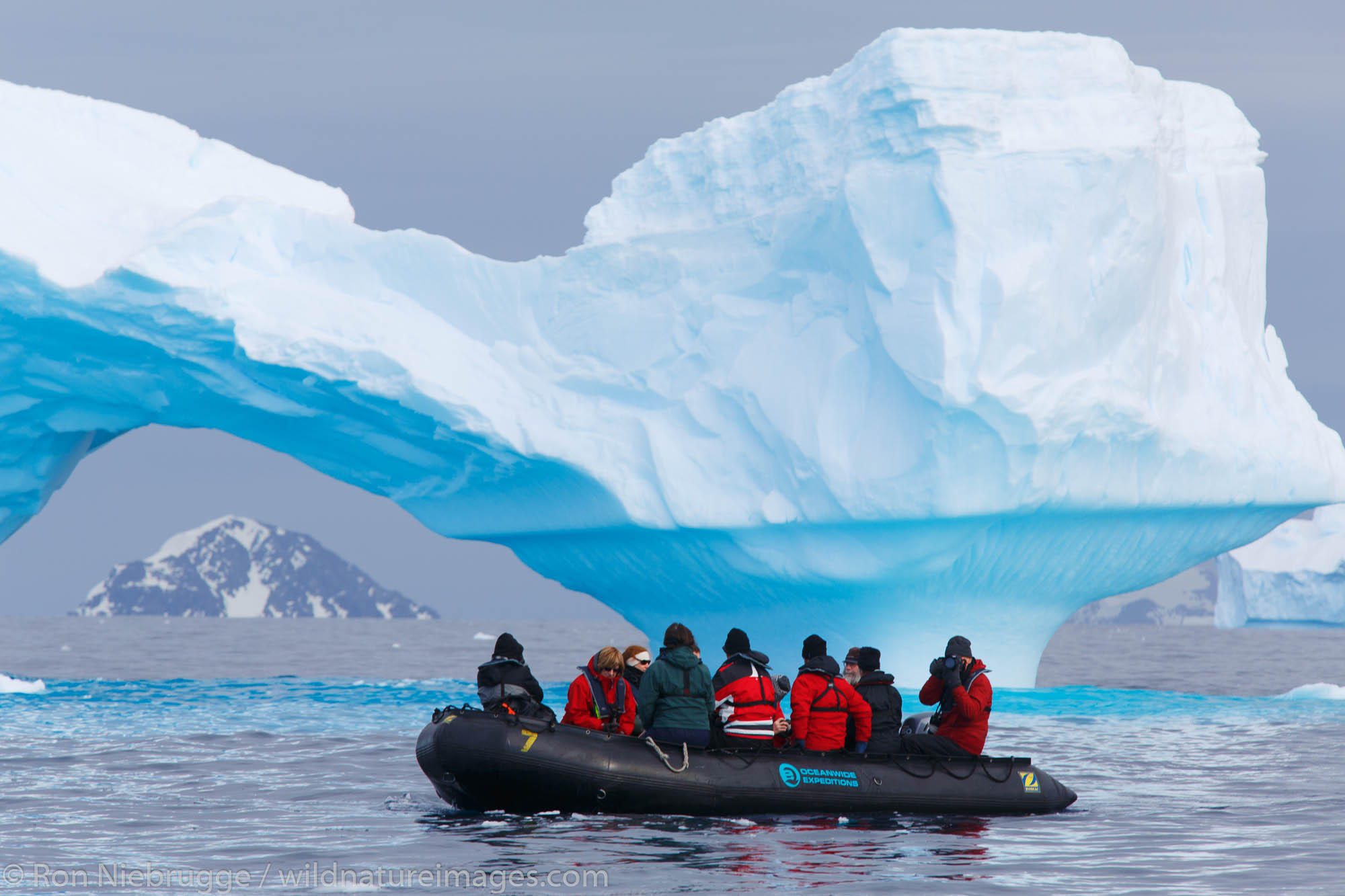 Visitors Zodiak cruising in Cierva Cove, Antarctica.