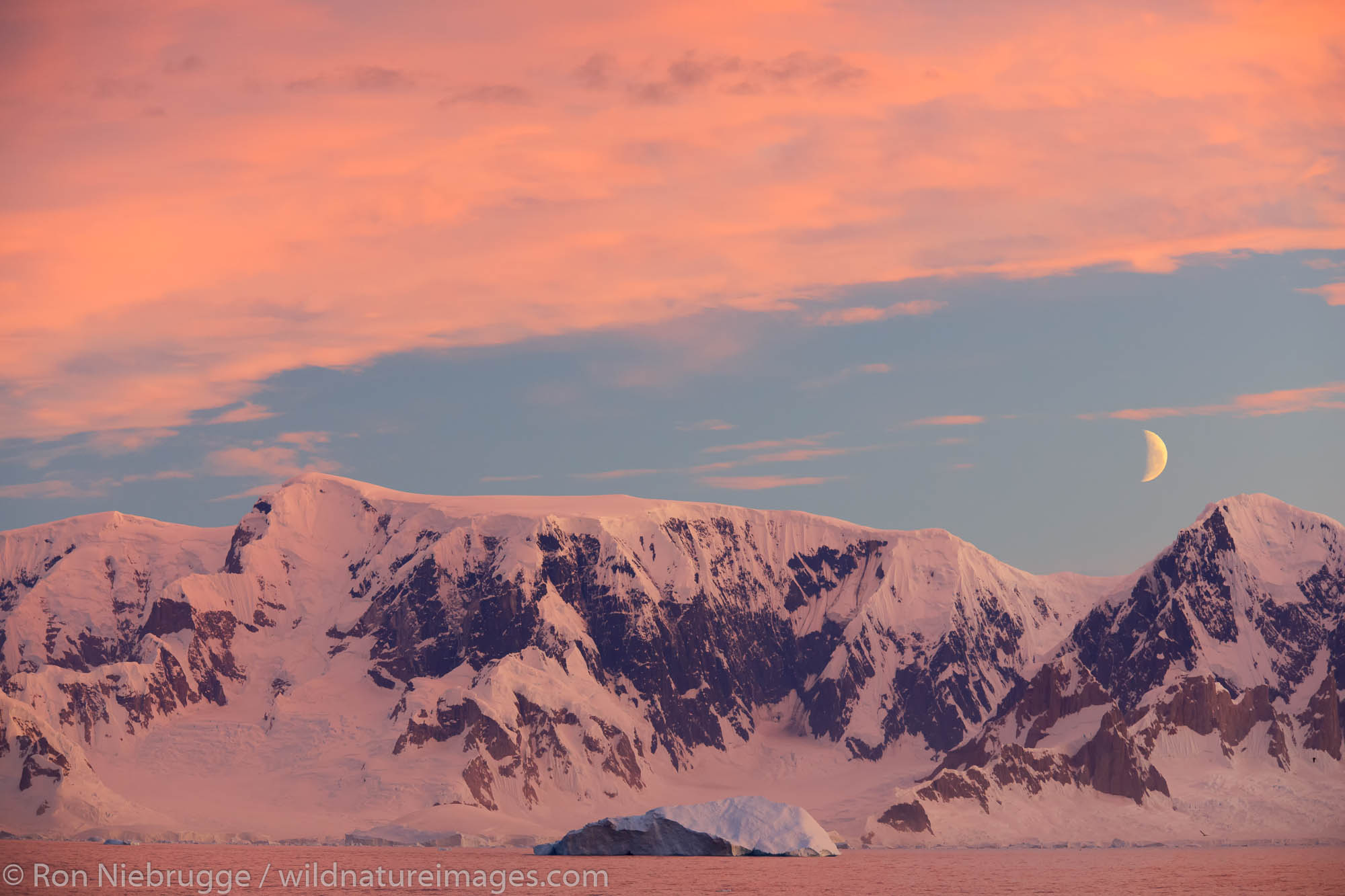 Sunset / sunrise as we travel below the Antarctic Circle, Antarctica.