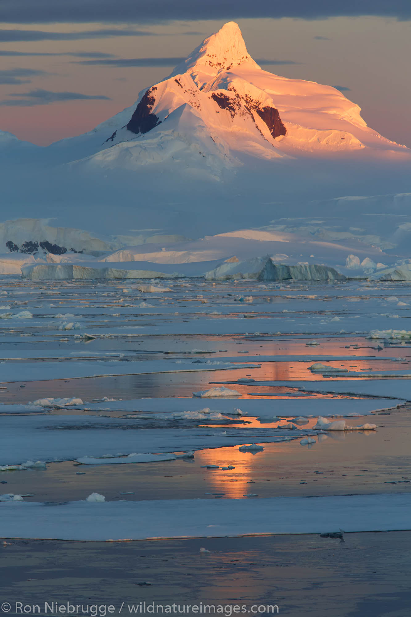Sunset / sunrise as we travel below the Antarctic Circle, Antarctica.