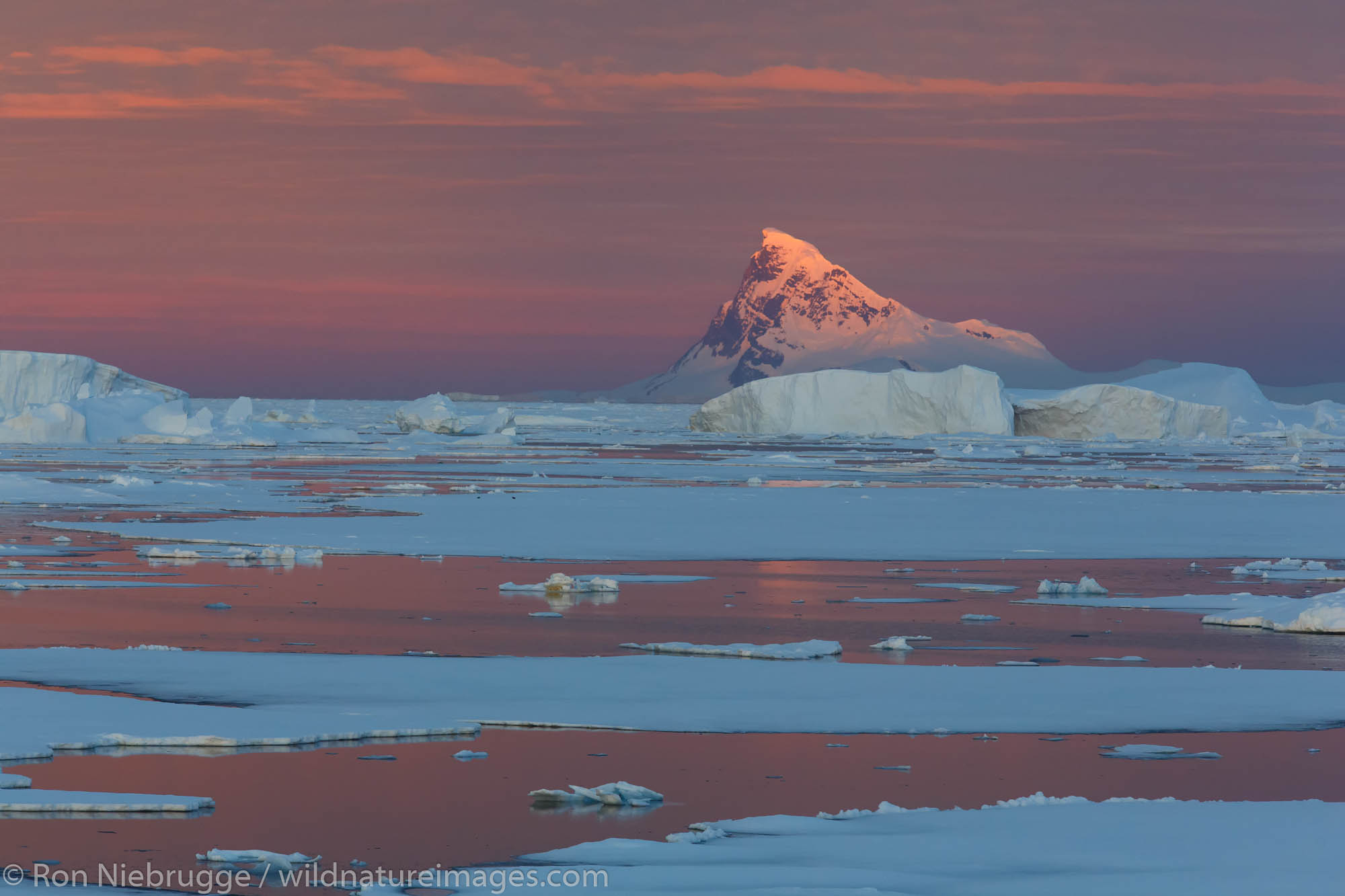 Sunset / sunrise as we travel below the Antarctic Circle, Antarctica.