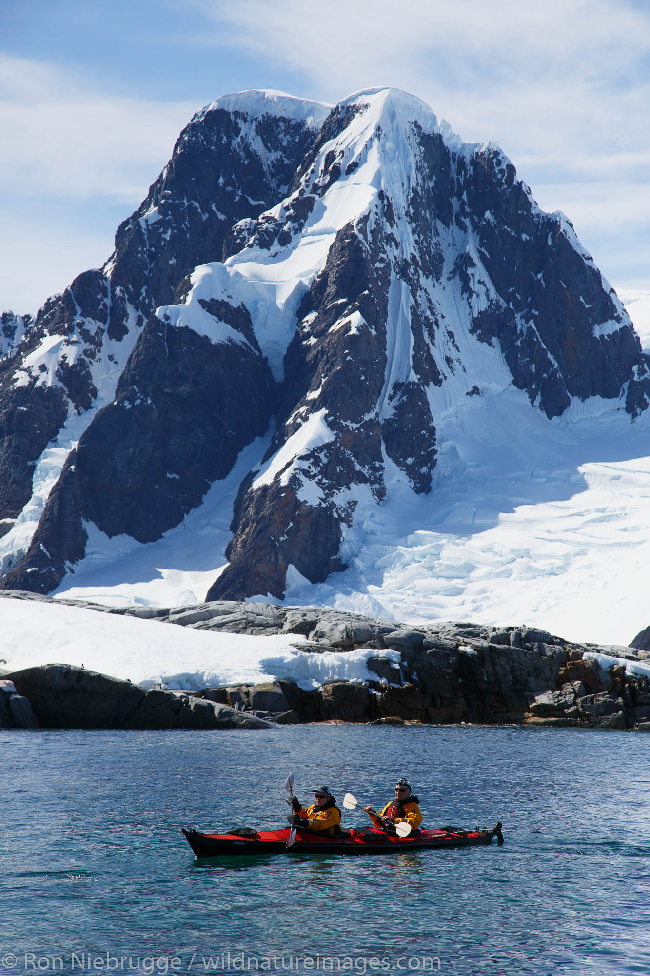 Kayakers at Petermann Island, Antarctica.
