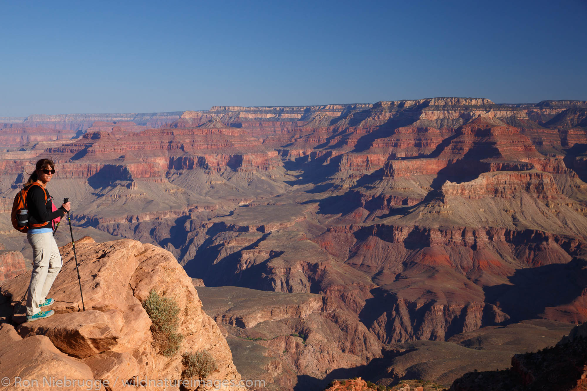 Hiker at Ooh-ahh Point on the South Kaibab Trail, Grand Canyon National Park, Arizona. (Model Released)