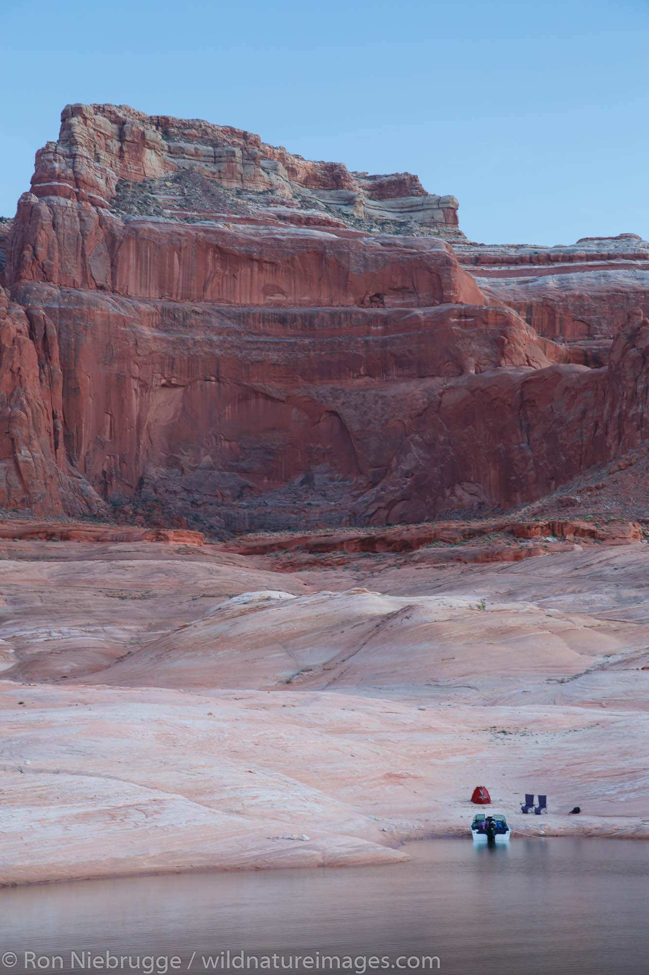 Boat camping in West Canyon, Lake Powell, Glen Canyon National Recreation Area, Page, Arizona.