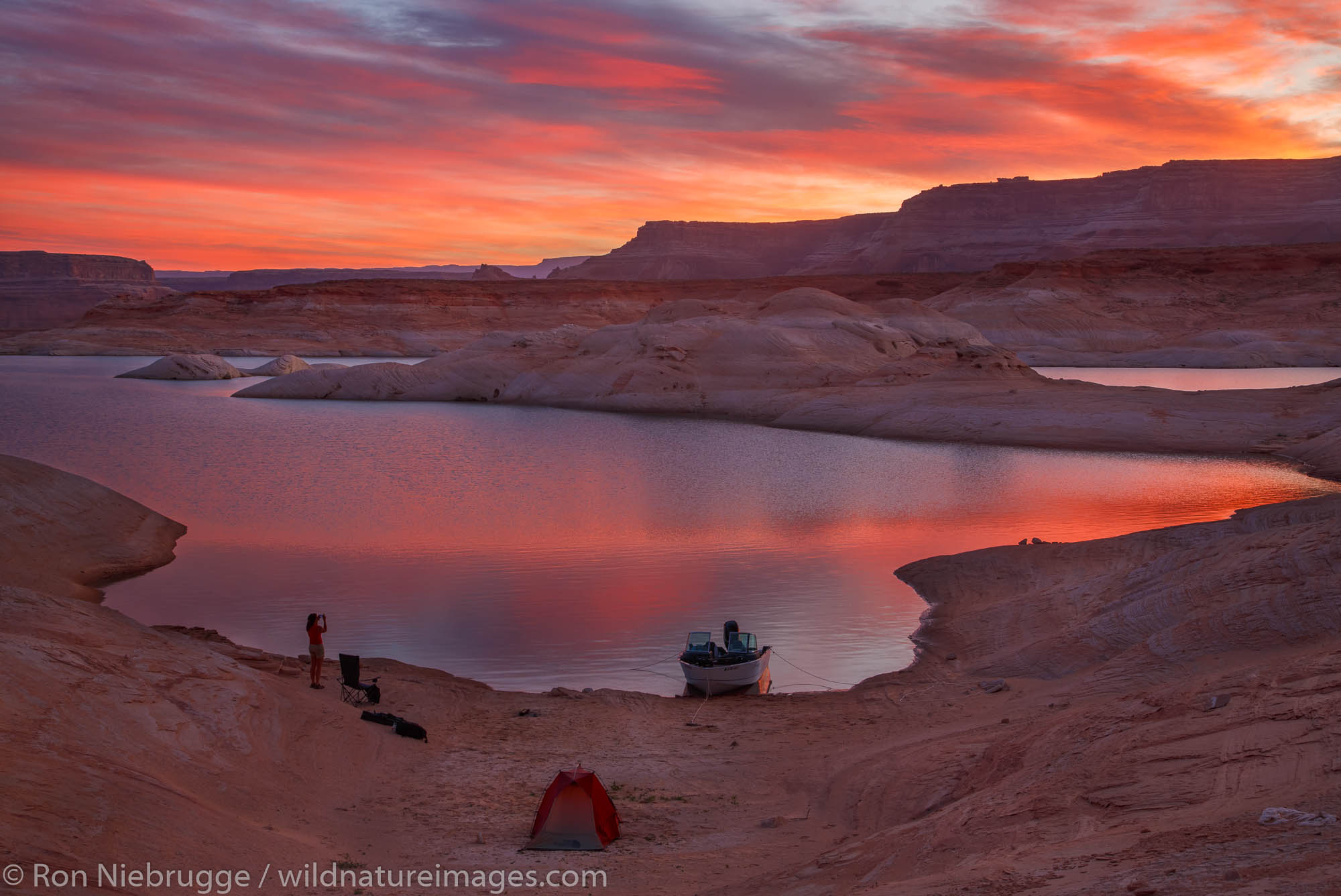 Camping in West Canyon at sunrise Lake Powell Glen Canyon National Recreation Area Page Arizona.