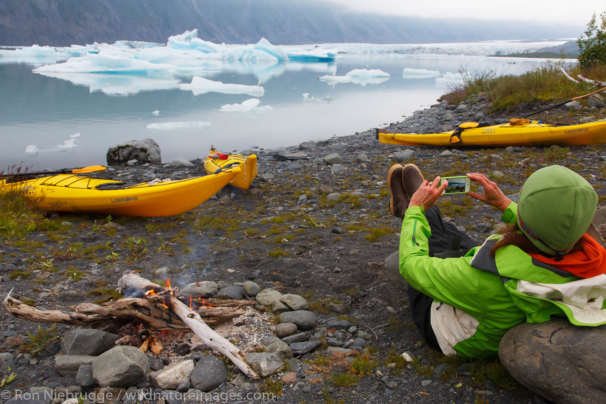 Kayaking and camping in Bear Glacier Lagoon, Kenai Fjords National Park, near Seward, Alaska.  (model released)