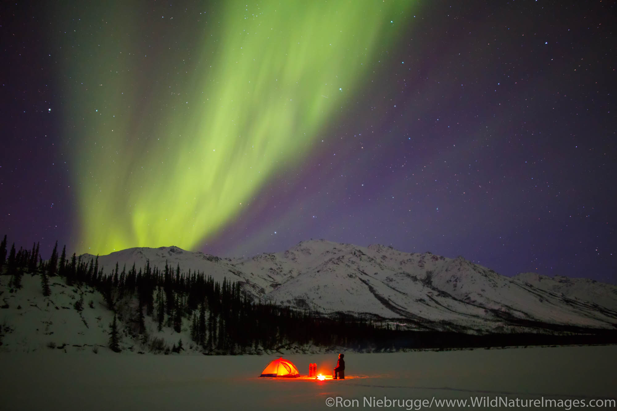 Camping under the Aurora Borealis in the Brooks Range Alaska.