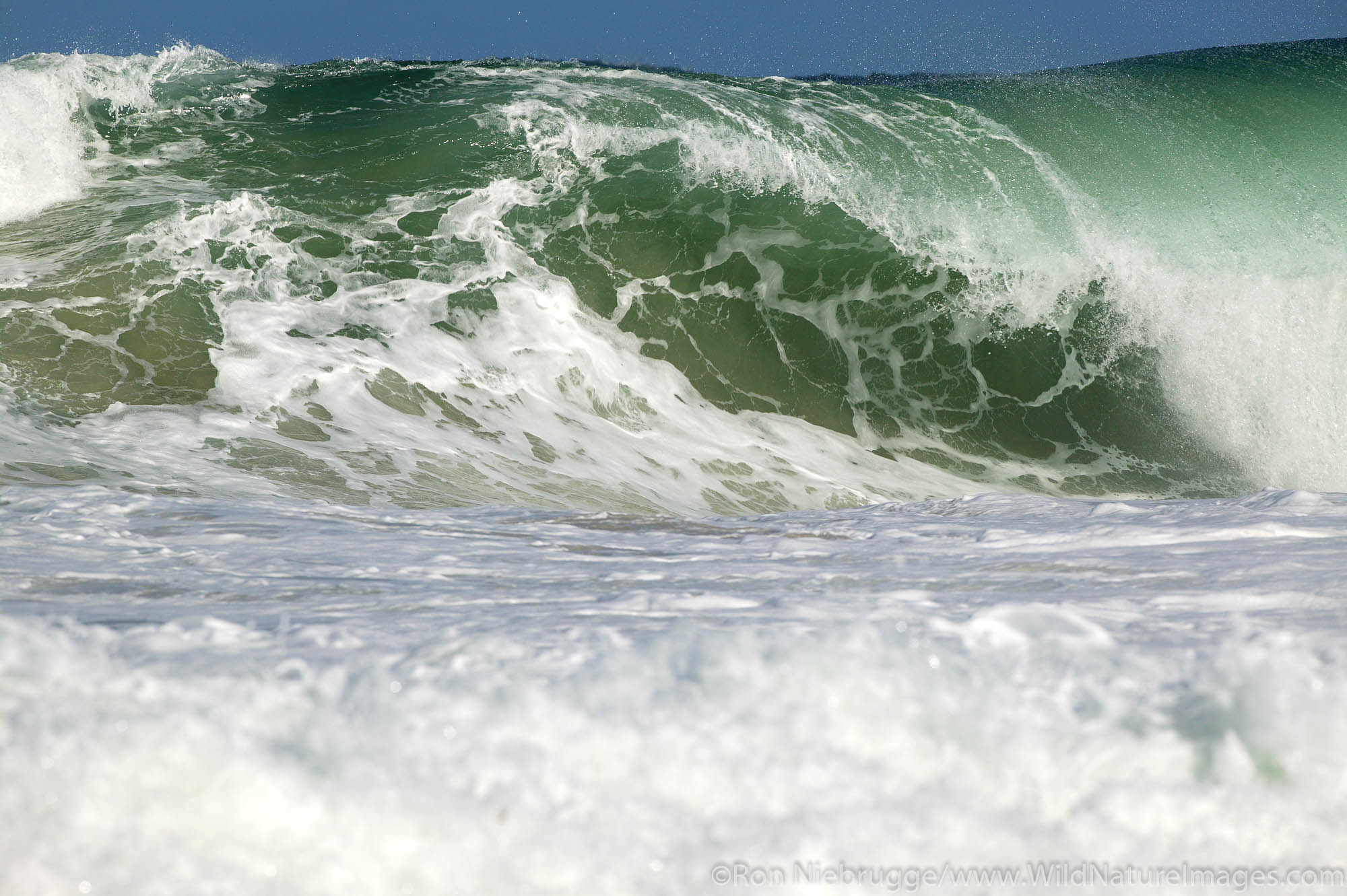 Waves crashing on beach.  Garrapata State Park, Big Sur Coast, California.