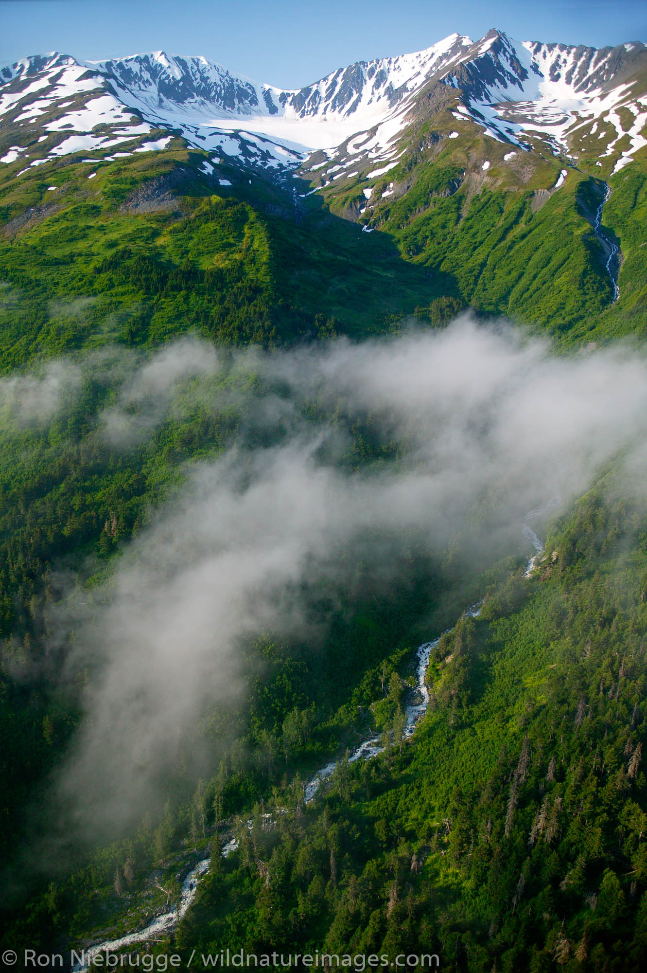 Mountains along Resurrection River Valley, Kenai Fjords National Park, aerial photo of the Kenai Peninsula, Alaska.